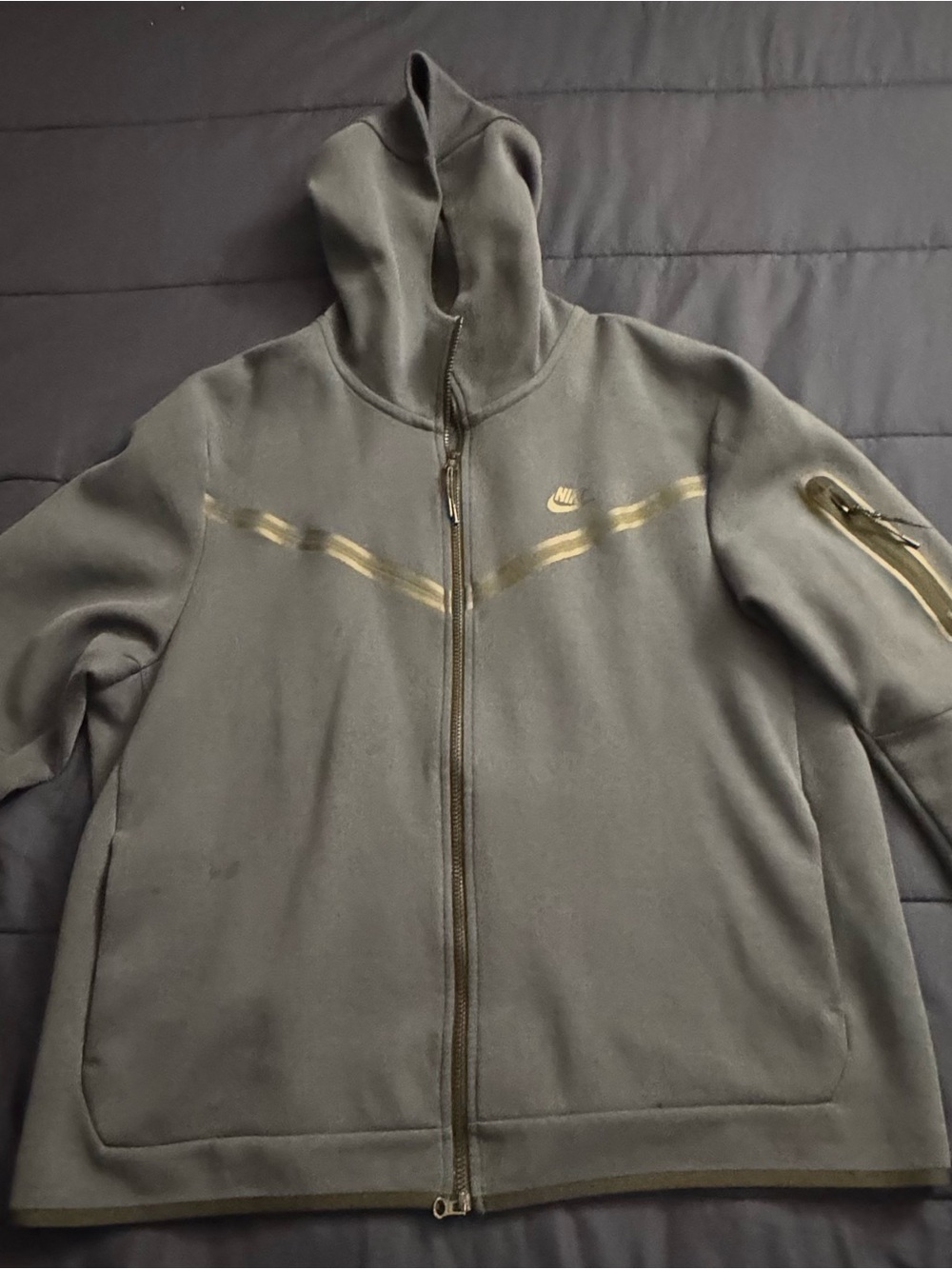 Nike Men's Dark Gray Hooded Zip Jacket with Subtle Gold Accents